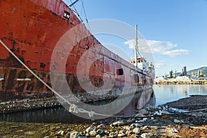 Decommissioned ships in a dismantling yard photo