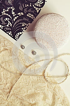 Deconstructed millinery materials lace and hat block