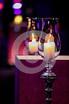 Decor with candles and lamps for corporate event or gala dinner