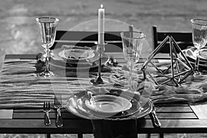 The decor of the festive table. Black and white.