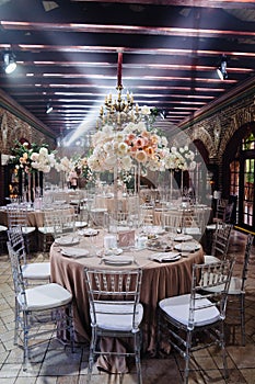 decor of fresh flowers in the restaurant for a wedding banquet.