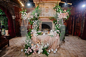 decor of fresh flowers in the restaurant for a wedding banquet.