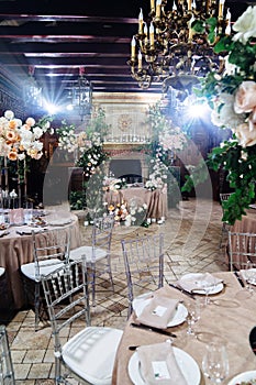 decor of fresh flowers in the restaurant for a wedding banquet.