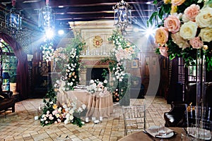 decor of fresh flowers in the restaurant for a wedding banquet.