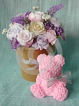 Decor for the house from soap - a bouquet of flowers and a bear from roses