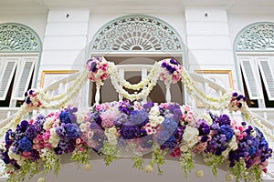 Decorated balcony with colorful beautiful flower, tropical clima photo