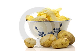 Decorated bowl with fresh potato chips