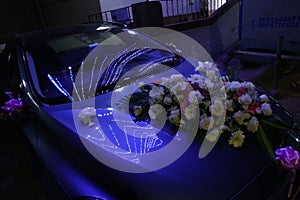 decorated car with flowers for a wedding