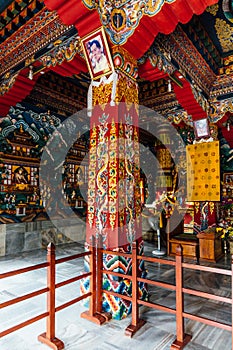 Decorated ceiling with Bhutanese art with His Majesty King Jigme Khesar Namgyel Wangchuck portrait.