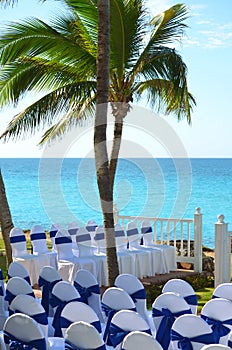 Decorated chairs lined up for a civic wedding ceremony at a resort hotel.