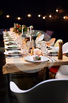 Decorated Christmas holiday table ready for dinner