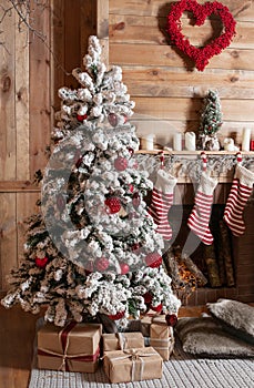 Decorated Christmas room with beautiful fir tree