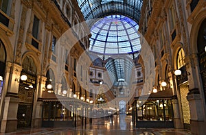 The decorated for Christmas shopping mall - Vittorio Emanuele II Gallery at dawn.