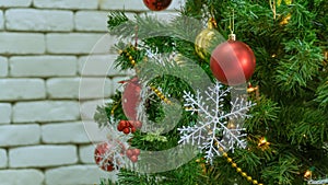 Decorated Christmas tree on blurred, sparkling and fairy whiteground