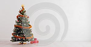 Decorated Christmas tree with gifts with free space on the right side, mock-up, gift card template