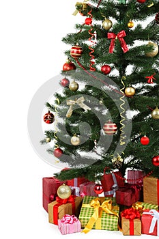 Decorated christmas tree with gifts on white background, close up