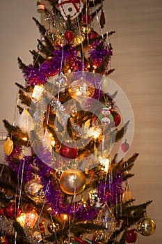 Decorated Christmas tree in the house photo