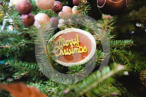 Decorated of Christmas tree with `Marry Christmas` label