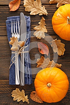 Decorated cutlery - fork and knife on a blue napkin