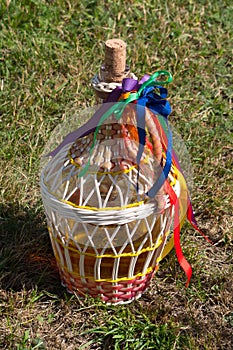 Decorated demijohns.