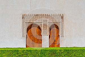 Decorated door inside of Alhambra palace in Granada, Spain