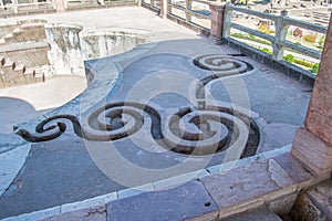 Decorated Drains at the top of old pool to catch roof water