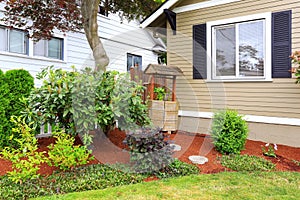 Decorated draw well on front yard.