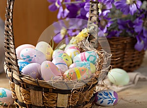 Decorated Easter eggs in a basket