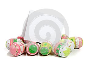 Decorated easter eggs with a blank notecard