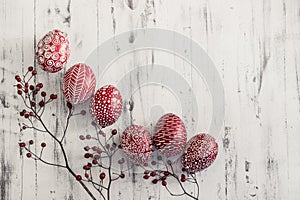 Decorated Easter eggs Pysanka on whitewashed wooden background