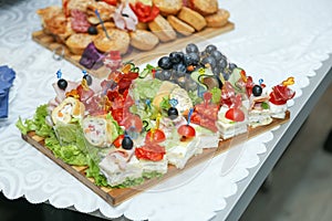 Decorated food on table prepared for wedding guests