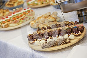 Decorated food on table prepared for wedding guests