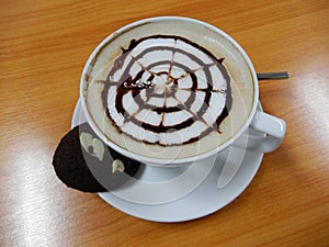 Decorated frothy Cappuccino