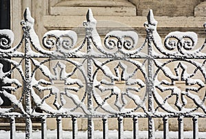 Decorated gate covered with snow