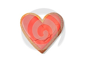 Decorated heart shaped cookie with cracks on white background, top view