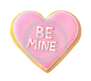 Decorated heart shaped cookie with phrase BE MINE