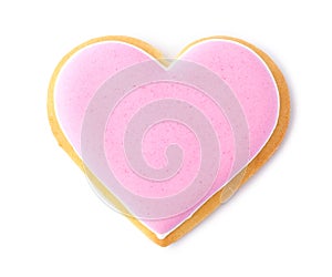 Decorated heart shaped cookie on white background