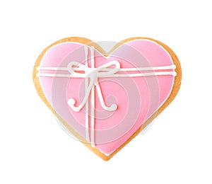 Decorated heart shaped cookie on white background