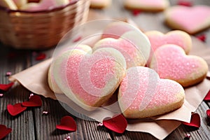 Decorated heart shaped cookie on wooden background. AI Generated