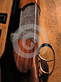 Decorated hunting rifle part, trigger and stock