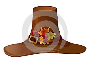 Decorated with leaves and berries, a brown wizard or pilgrim hat for Thanksgiving and Halloween holidays