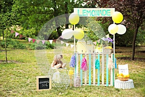 Decorated lemonade stand with glassware