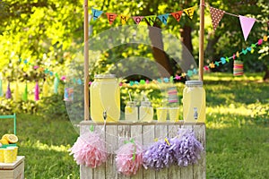 Decorated lemonade stand. Summer refreshing natural drink