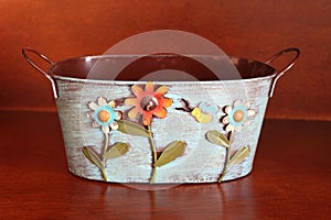 Decorated metal basket