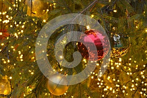 Decorated natural Christmas tree closeup. Greeting card