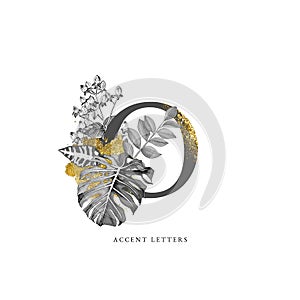 Decorated O letter with hand drawn tropical leaves photo