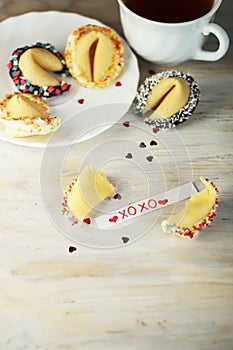 Decorated open fortune cookie with blank