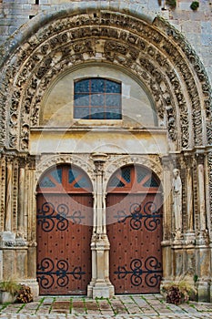 Decorated portal of the medieval church of Notre Dame-Saint Lazare in Avallon, France