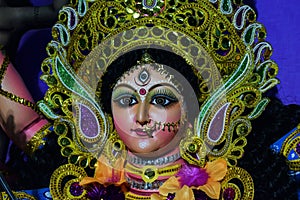 Decorated and sculpture Face of devi durga, the hindu goddess during durgapuja festival