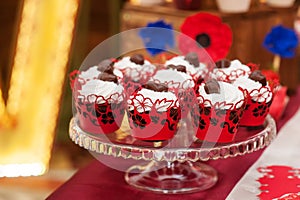 Decorated set of cupcakes or fairy cake for wedding on table